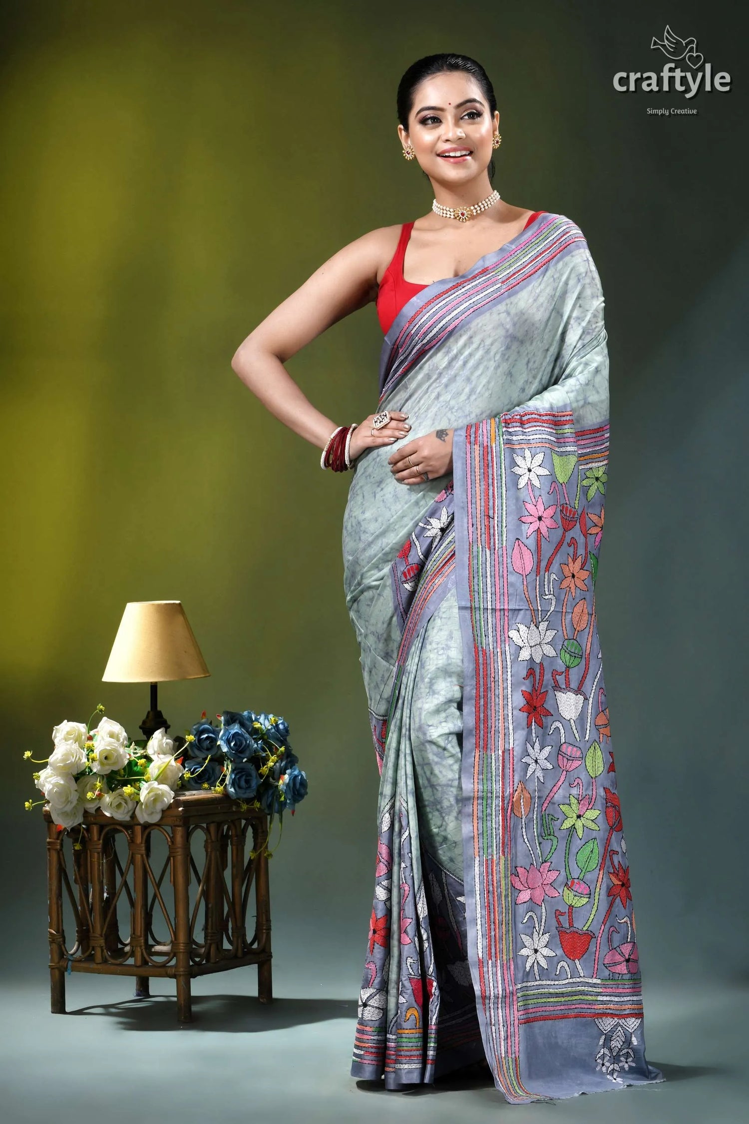 Beautiful floral motif hand batik silk kantha saree in opal woman wears light gray saree 6