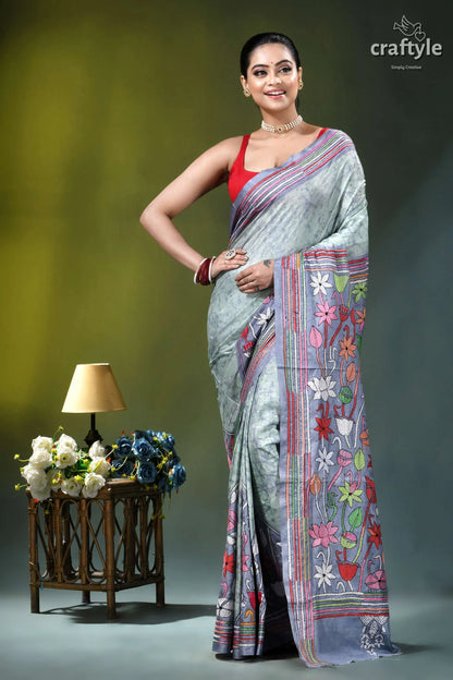 Beautiful floral motif hand batik silk kantha saree in opal woman wears light gray saree 6