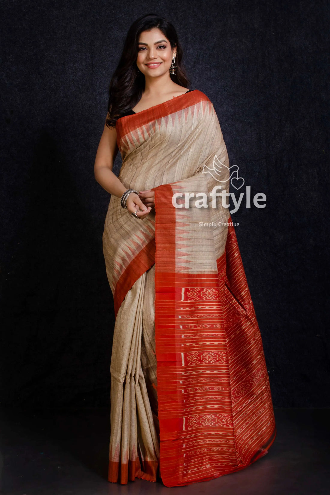 Beige and fire orange sambalpuri ikat tussar ghicha silk saree beige rust-orange silk saree intricate 1