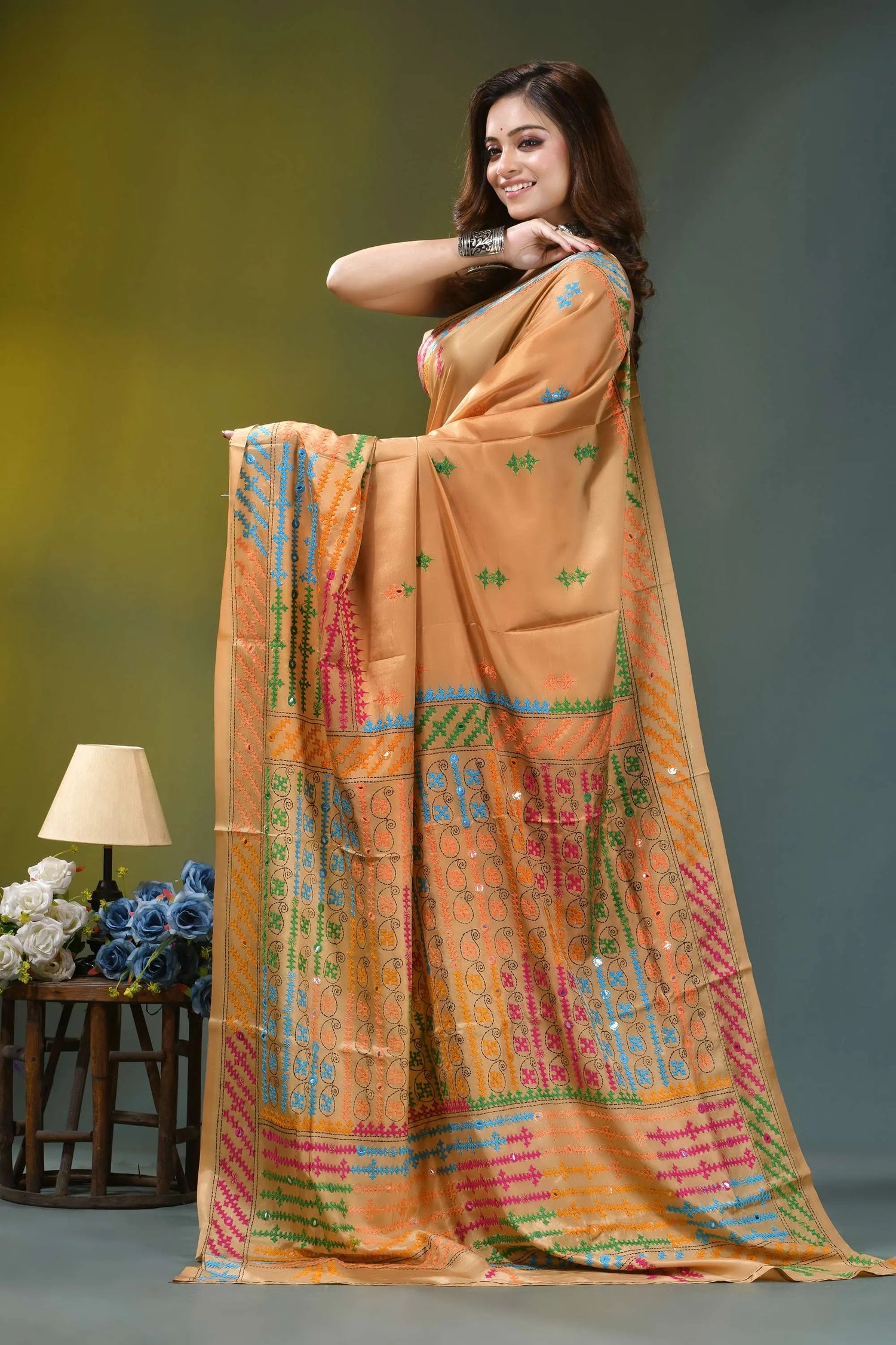 Beige gold multicolor thread hand kutch embroidered silk saree - mirror work vibrant orange saree intricate