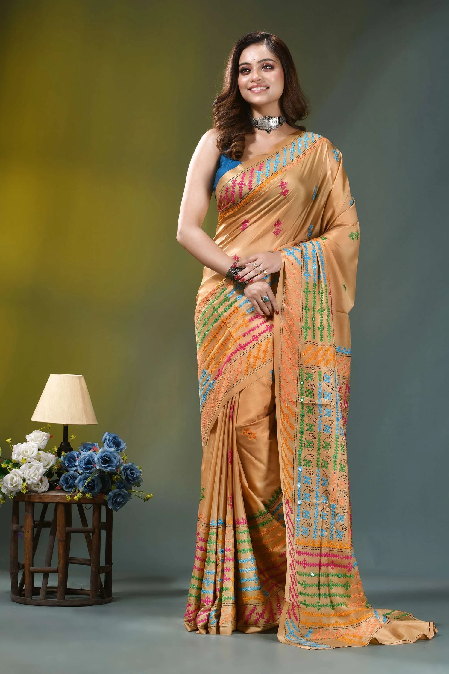 Beige gold multicolor thread hand kutch embroidered silk saree - mirror work woman wears golden-orange silk saree 6