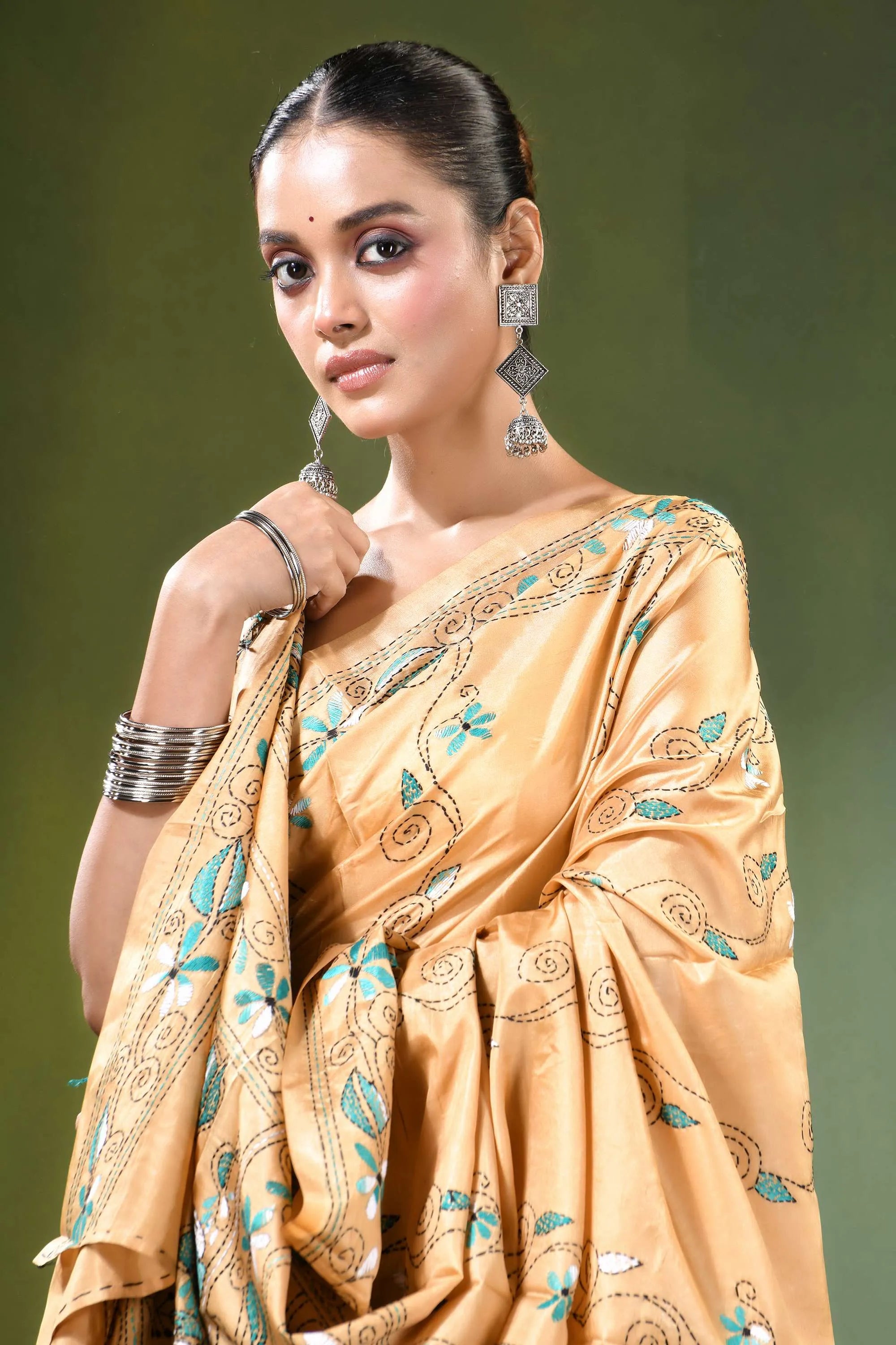 Beige village theme handcrafted silk kantha saree woman wears golden-yellow 2