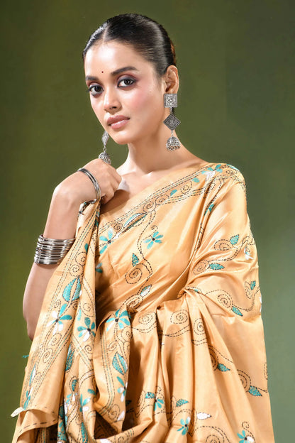 Beige village theme handcrafted silk kantha saree woman wears golden-yellow 2