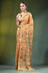 Beige village theme handcrafted silk kantha saree woman wears golden-orange 6