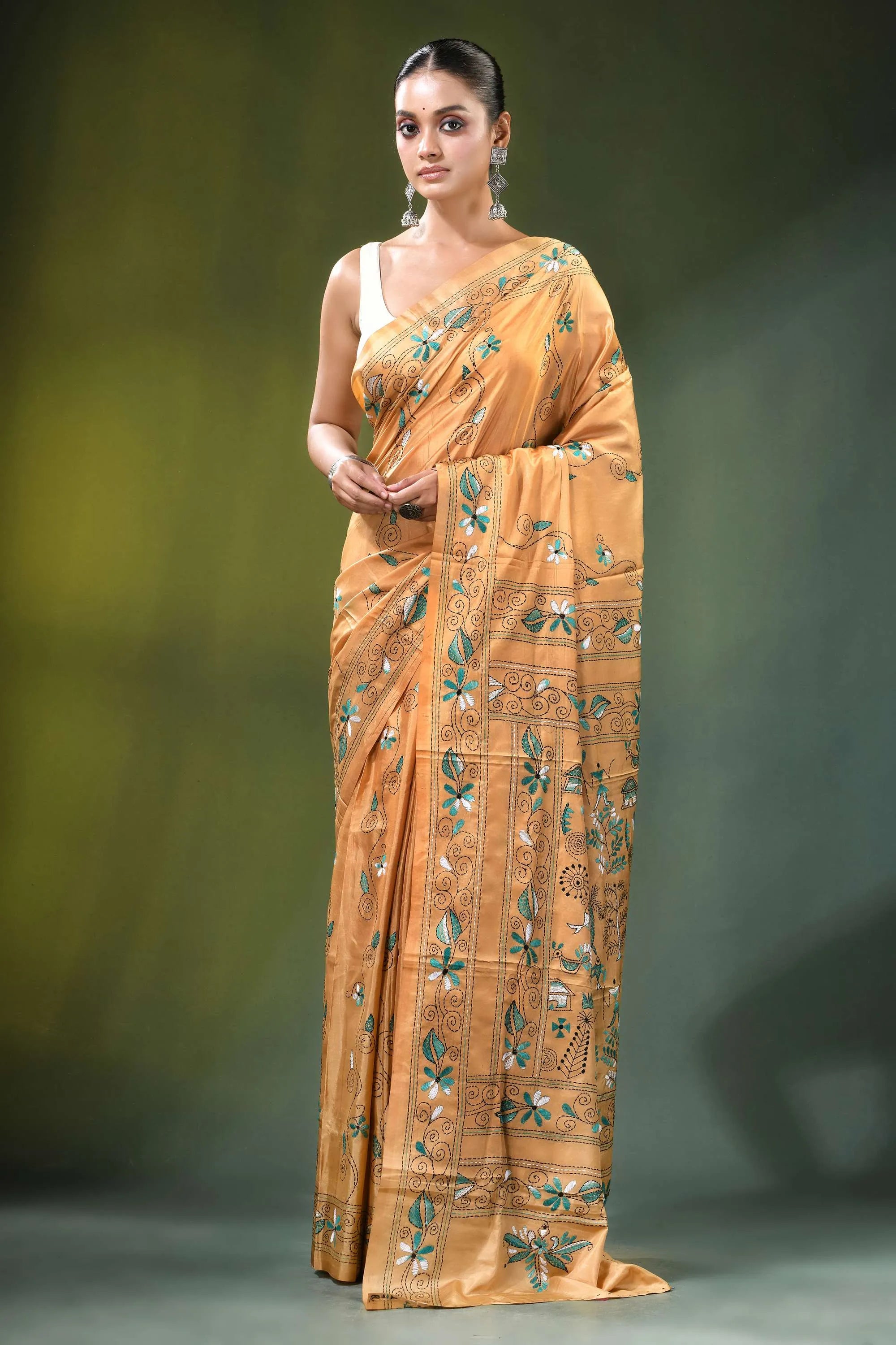 Beige village theme handcrafted silk kantha saree golden-orange intricate green silver 1