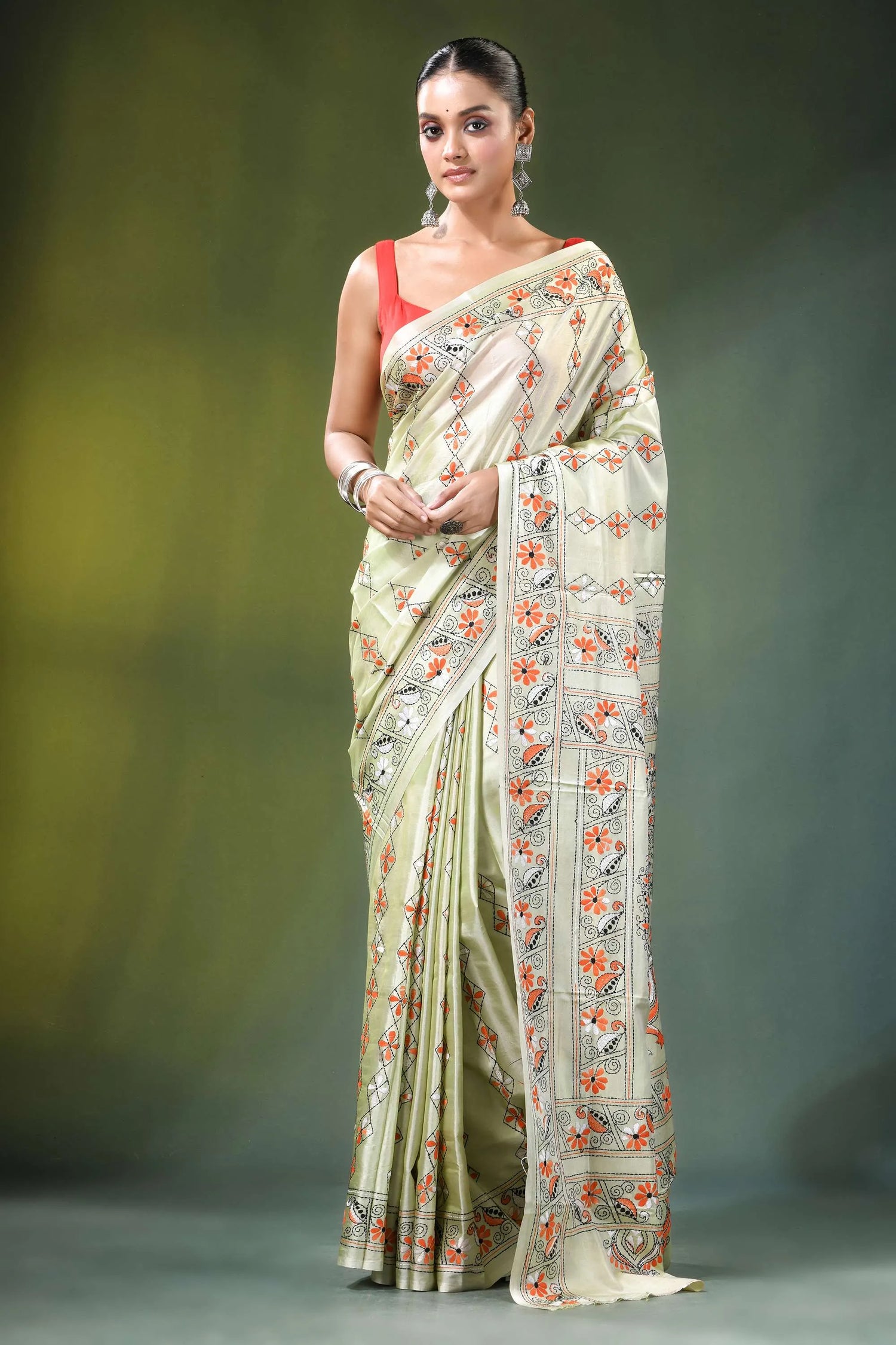 Beryl green peacock design handcrafted silk kantha saree woman wears off-white 1