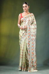 Beryl green peacock design handcrafted silk kantha saree woman wears off-white 1