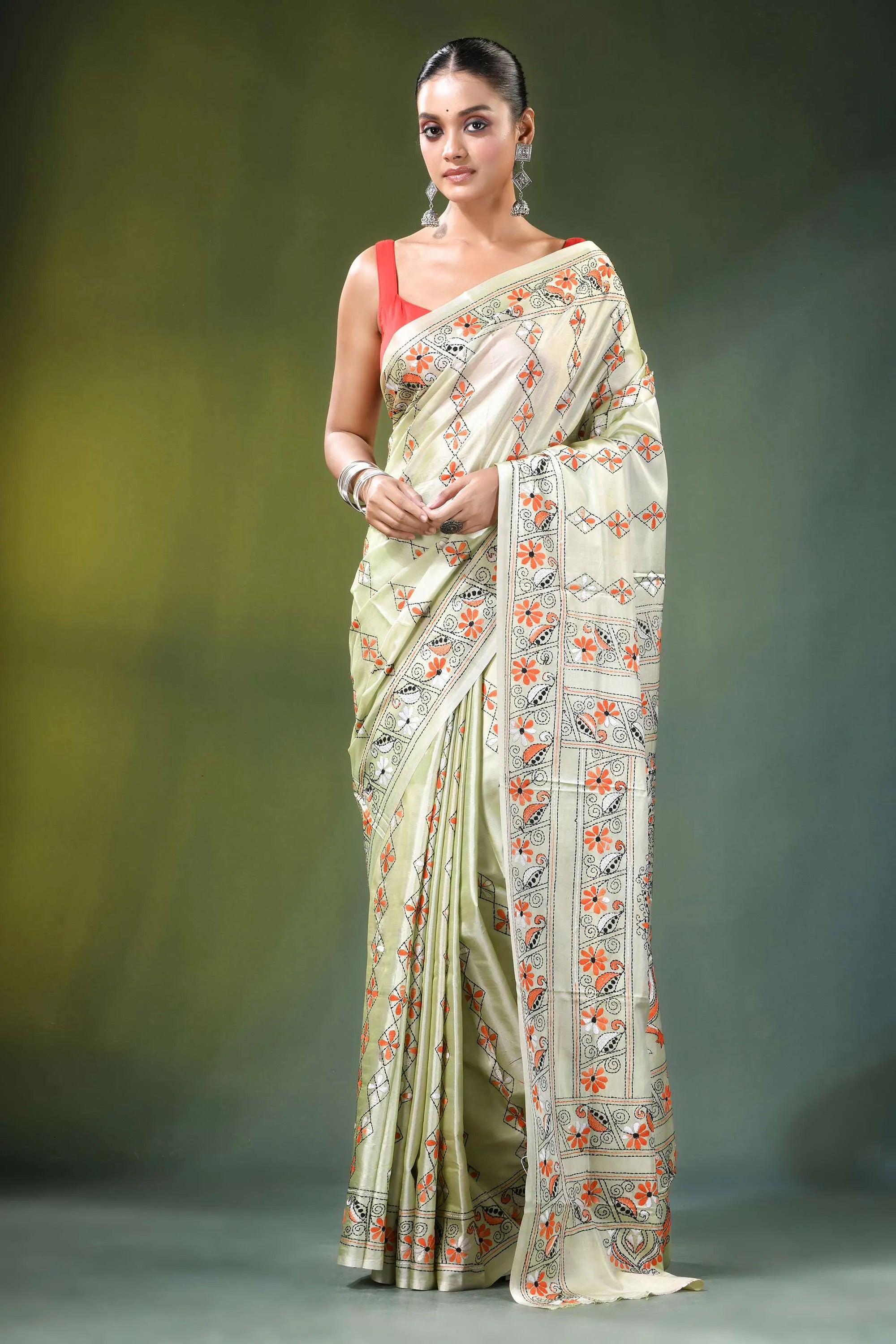 Beryl green peacock design handcrafted silk kantha saree woman wears off-white 1