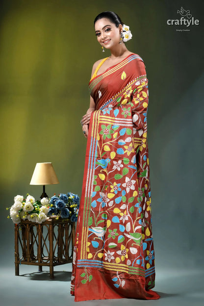Bird motif kantha embroidery silk saree in roof terracotta woman wears rich rust-colored saree 3