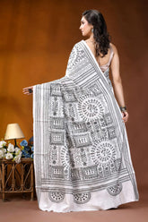 Black thread warli motif hand embroidered silk kantha saree in white woman wears white saree intricate 5