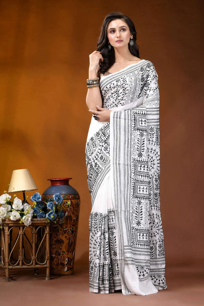 Black thread warli motif hand embroidered silk kantha saree in white woman wears white saree intricate 6