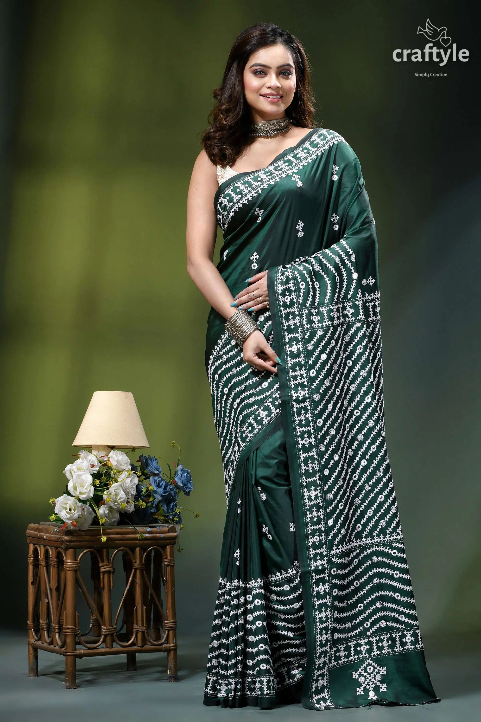 Bottle green kutchi embroidery handmade silk saree with mirror work deep green silk saree intricate 1