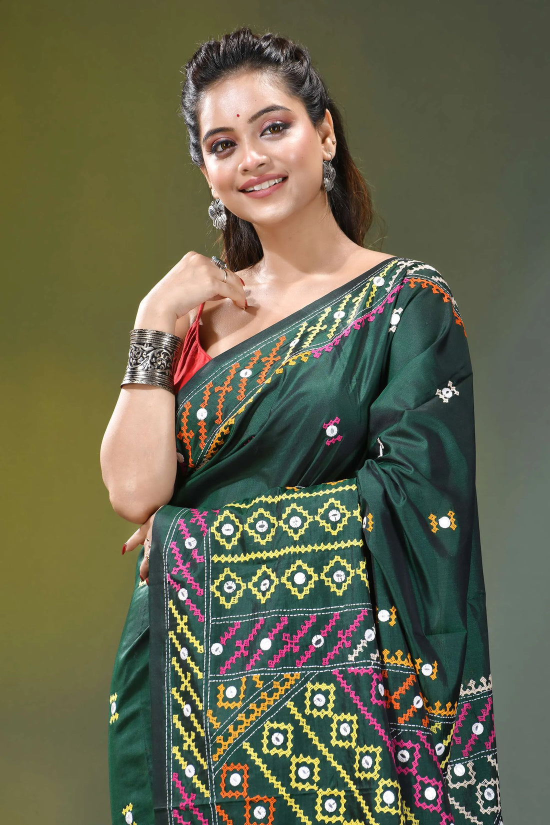 Bottle green multi-thread handmade gujrati stitch silk sari - mirror work dark green silk saree adorned 2