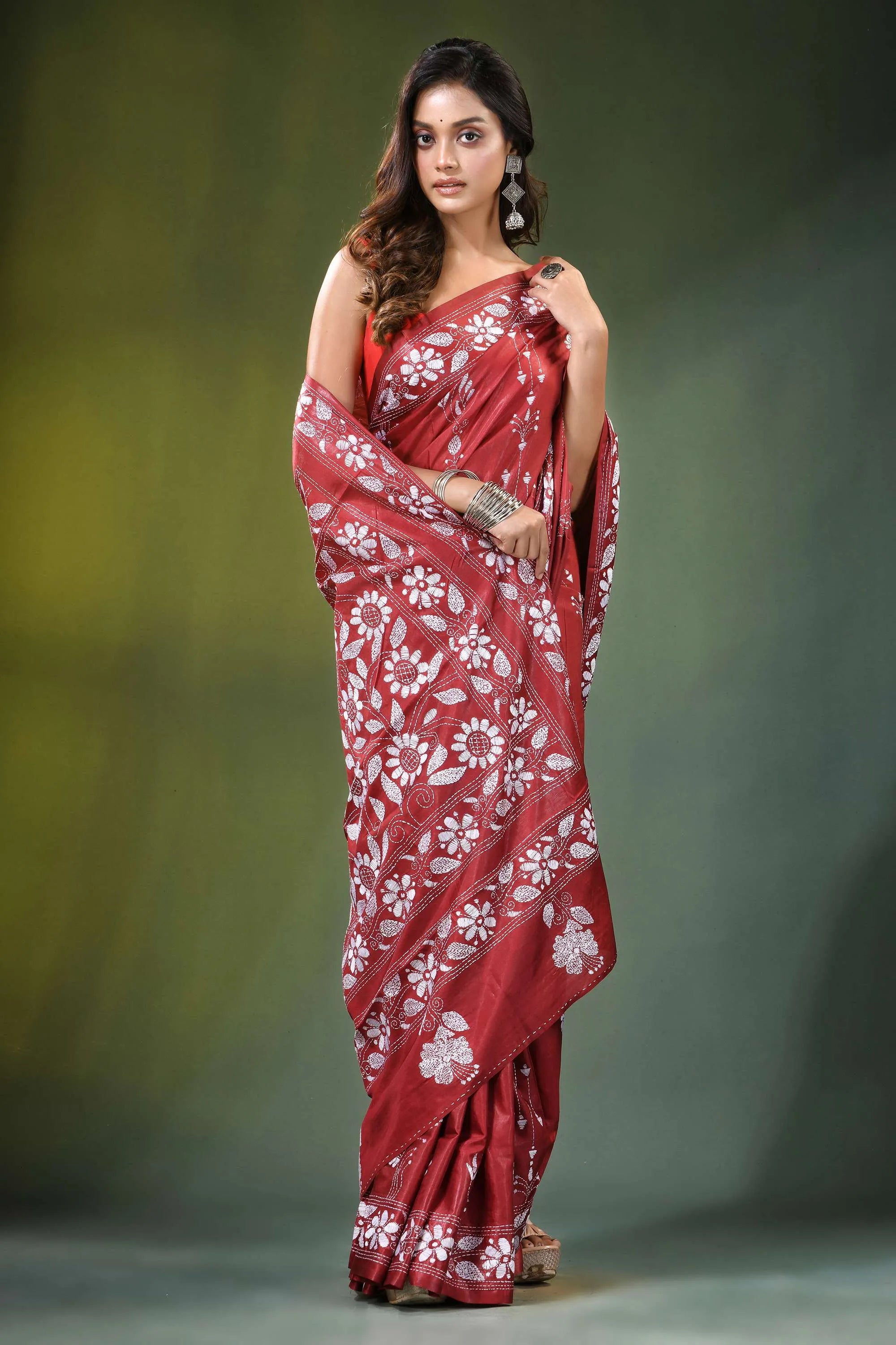 Brick red floral design handcrafted silk kantha stitch saree rich crimson adorned intricate 4