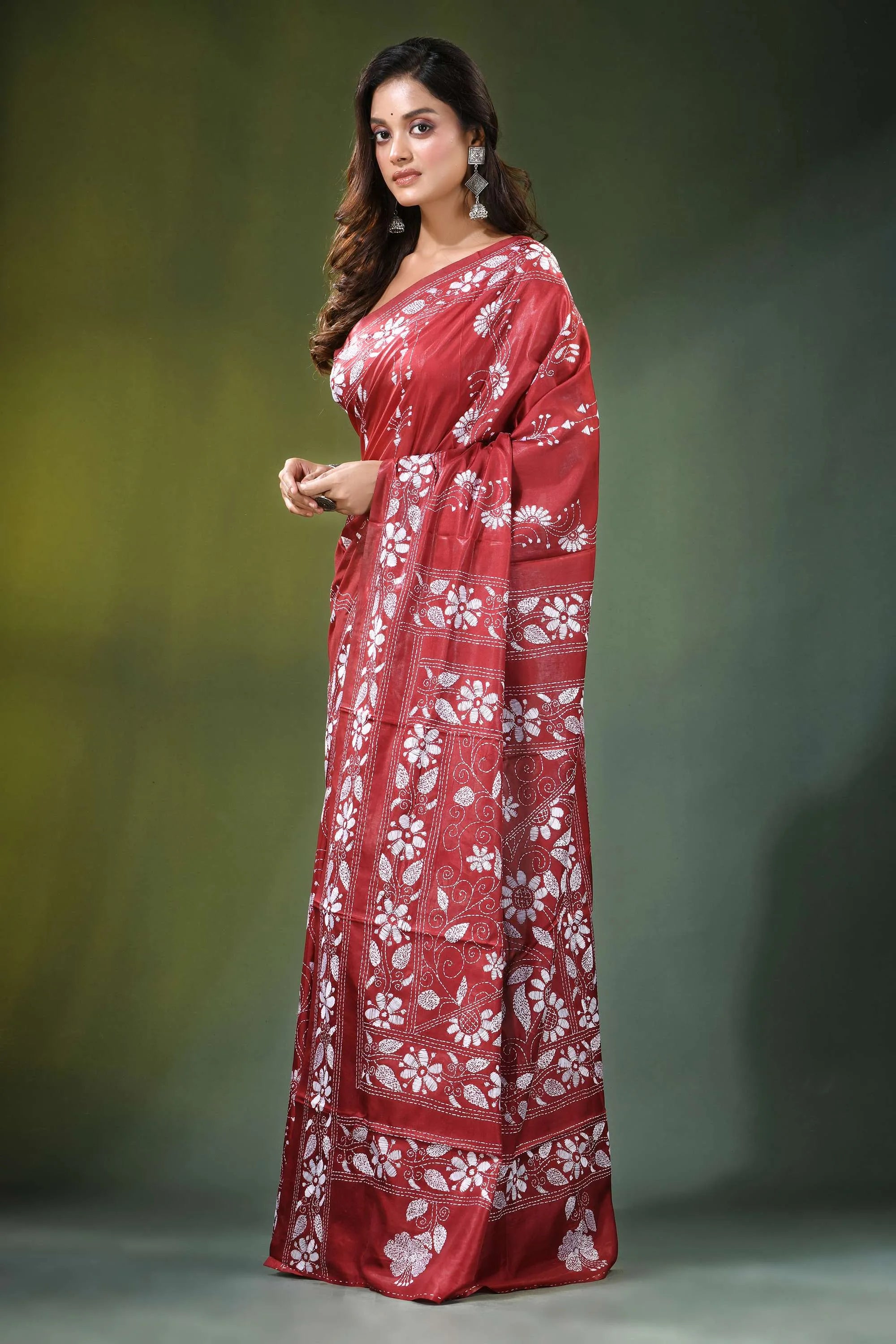 Brick red floral design handcrafted silk kantha stitch saree vibrant adorned intricate 3