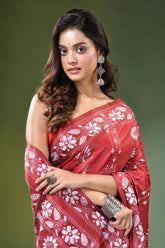 Brick red floral design handcrafted silk kantha stitch saree woman wears vibrant 2
