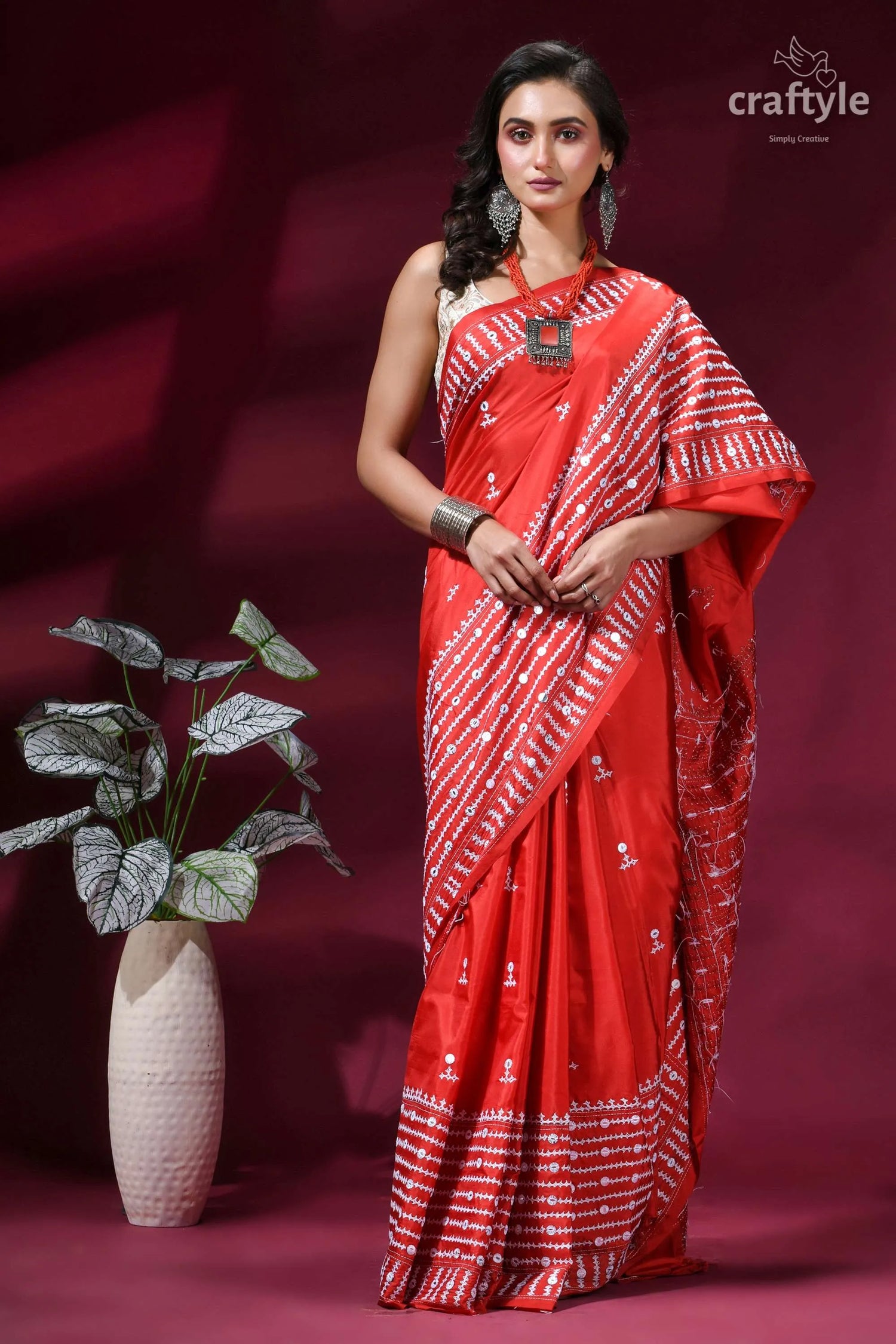 Brick red intricate gujrati stitched silk saree with mirror work vibrant red silk saree intricate 1