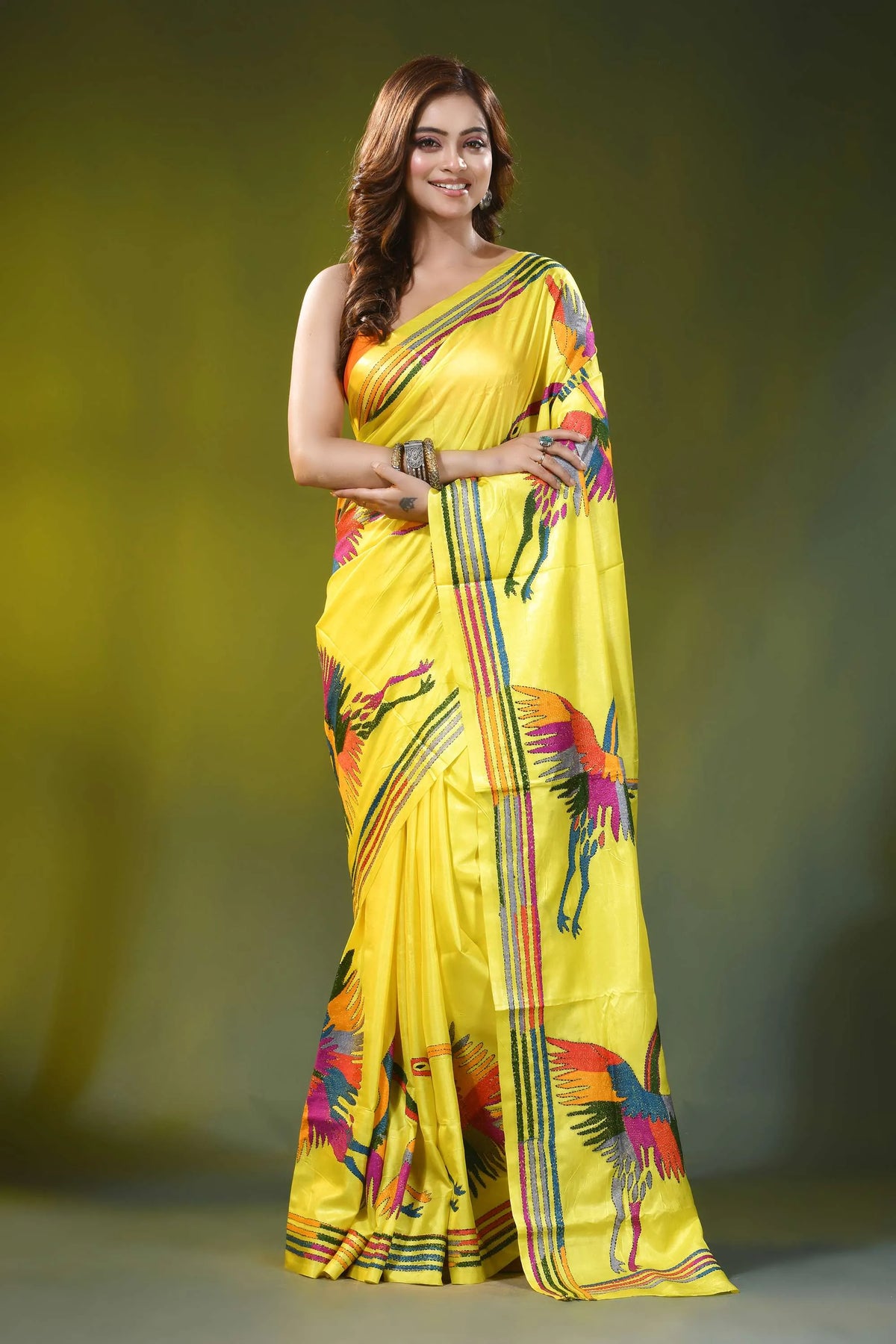Bright yellow silk kantha stitch saree with multicolor heron motif 1