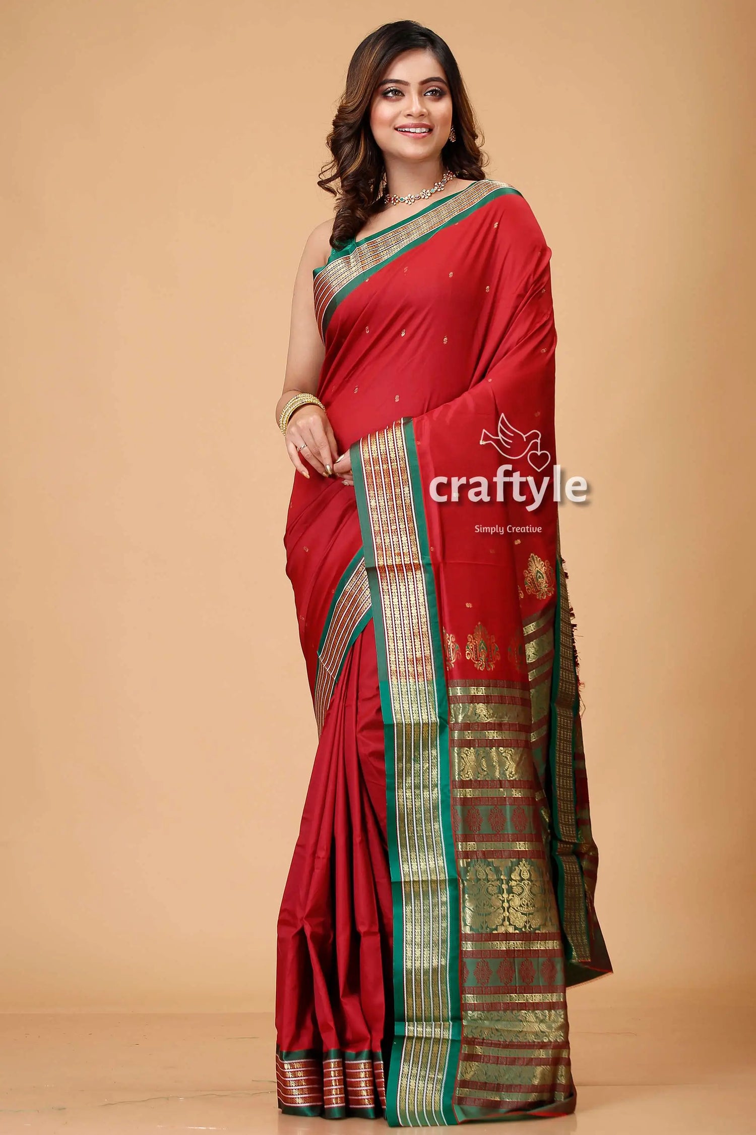 Burgundy bomkai silk saree with zari and meenakari accents red saree green gold border 1