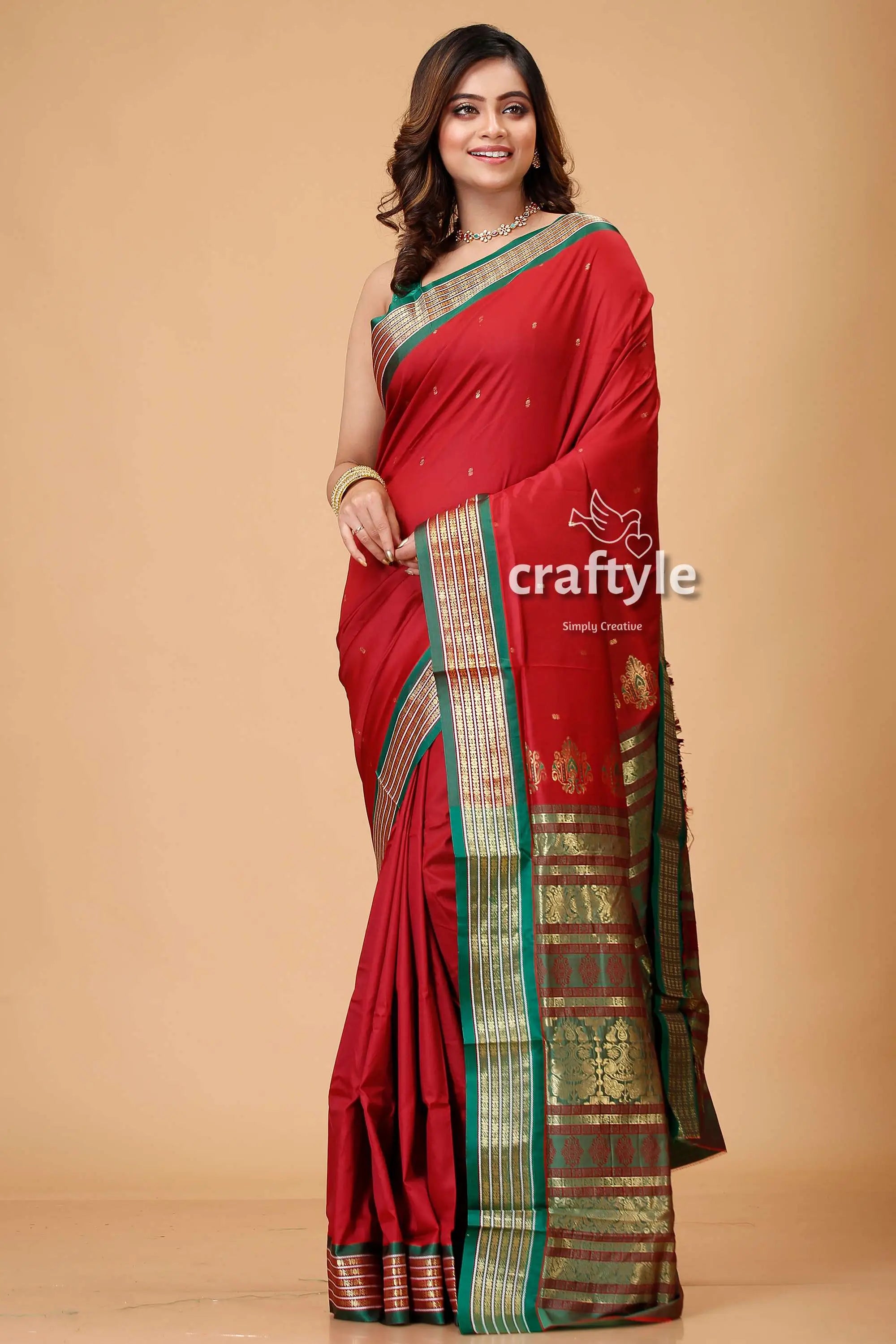 Burgundy bomkai silk saree with zari and meenakari accents red saree green gold border 1