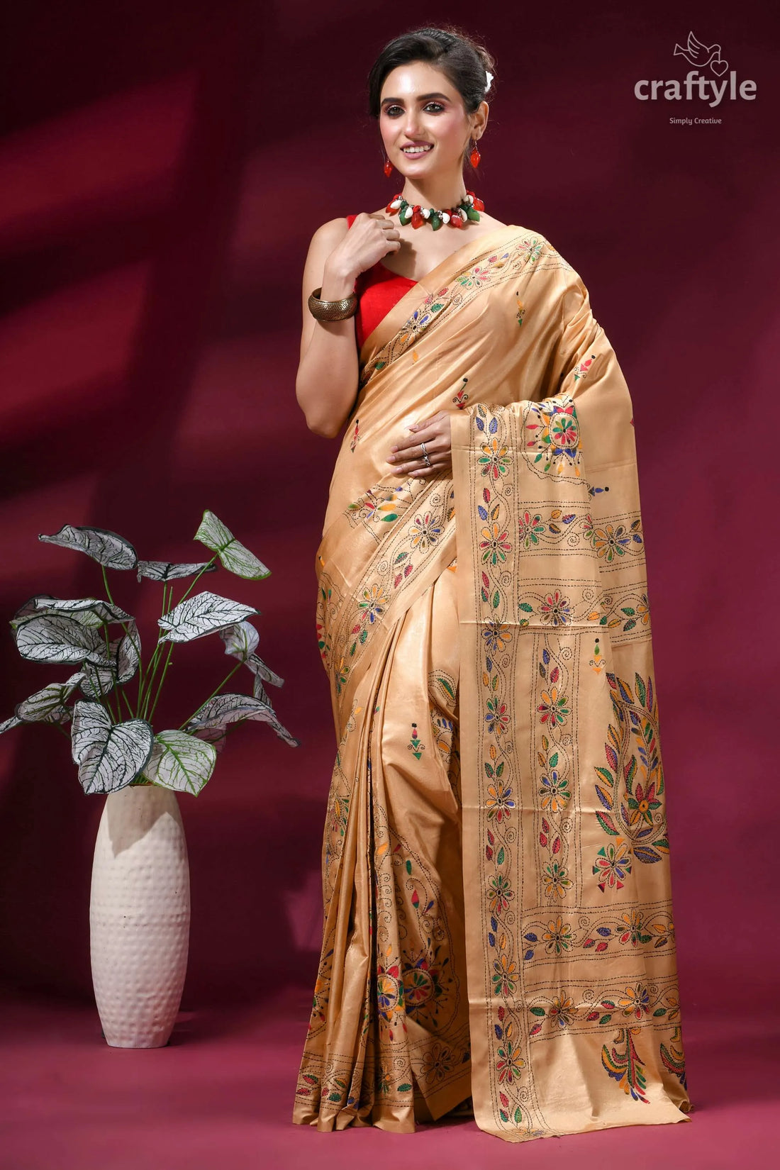 Burly wood ethnic design silk kantha stitch saree woman wears golden silk saree 1