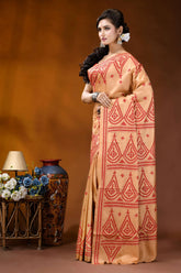 Burning sand ethnic motif hand embroidered silk kutch work saree woman wears peach-colored saree intricate 3