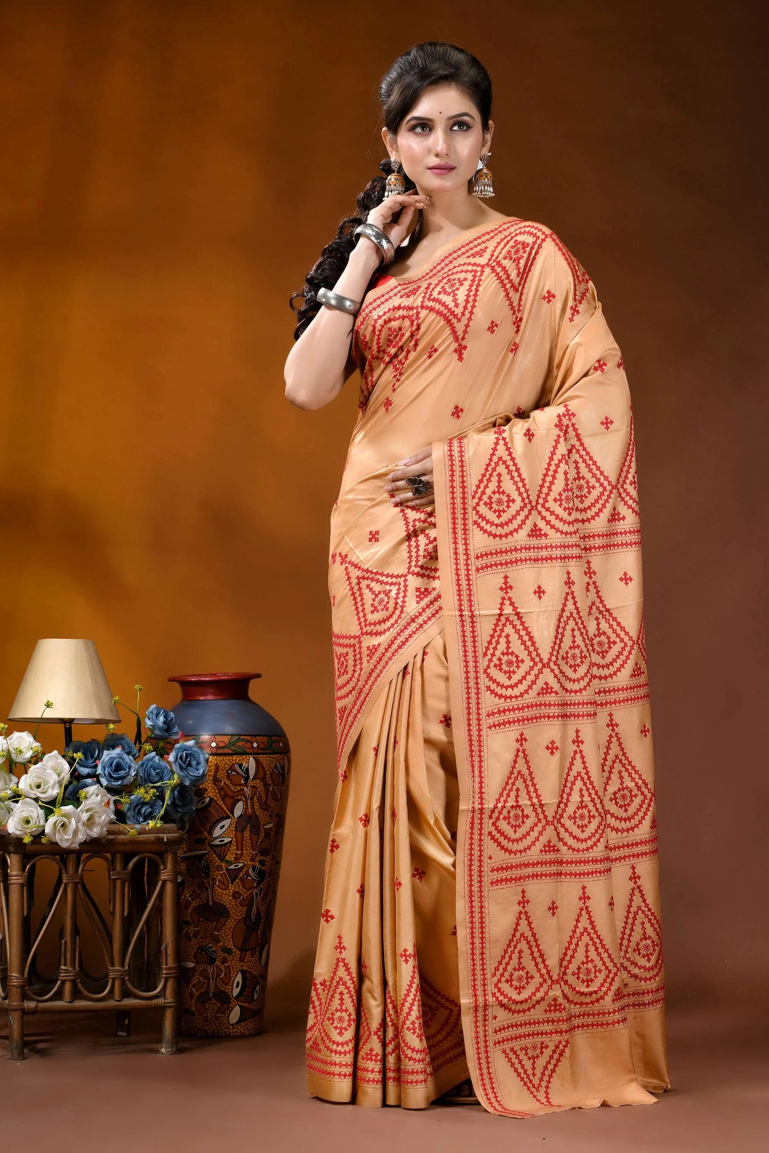 Burning sand ethnic motif hand embroidered silk kutch work saree woman wears beige saree intricate 6