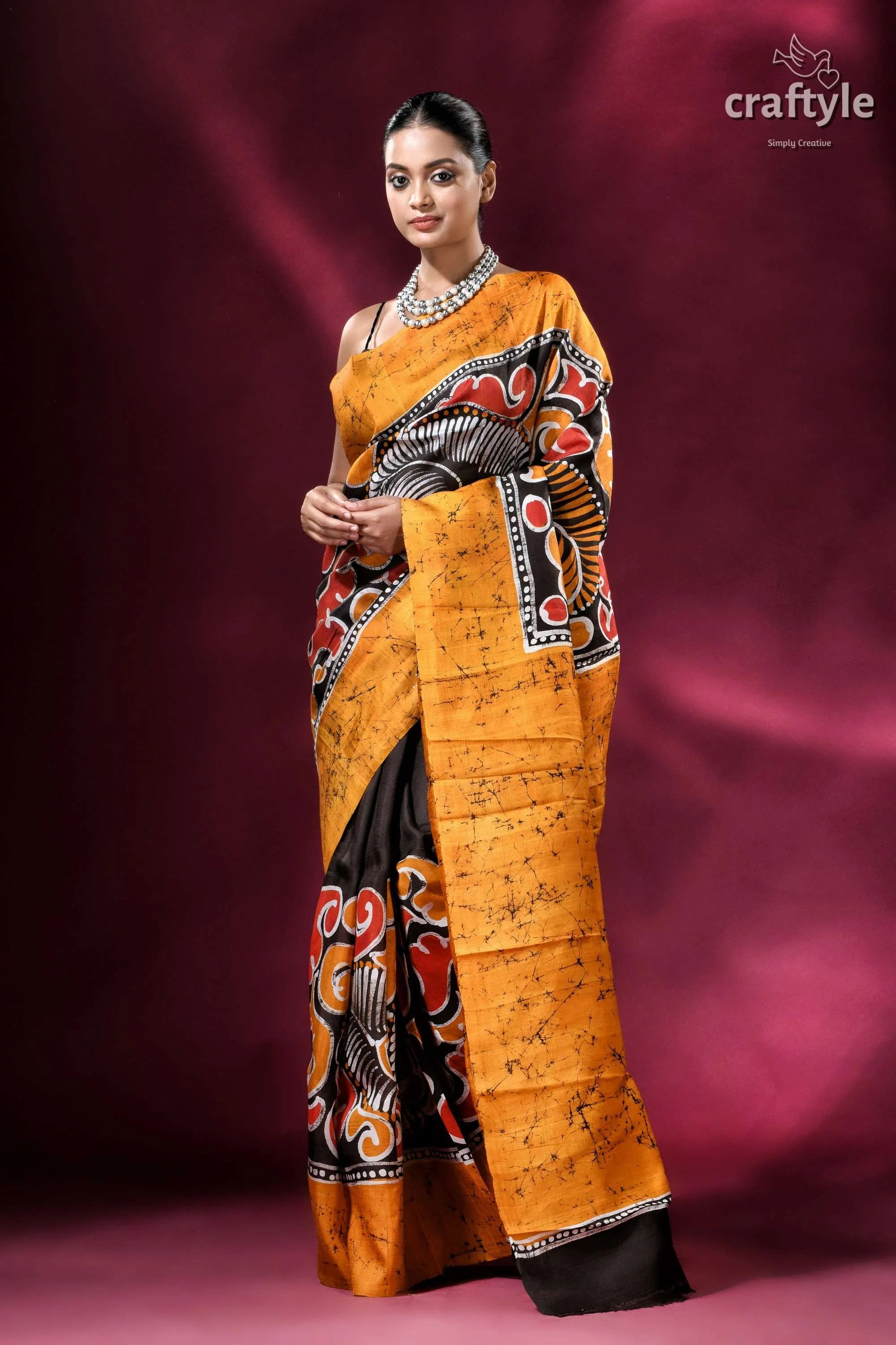 Carrot orange and black hand-painted wax batik pure mulberry silk saree vibrant orange black batik saree 1