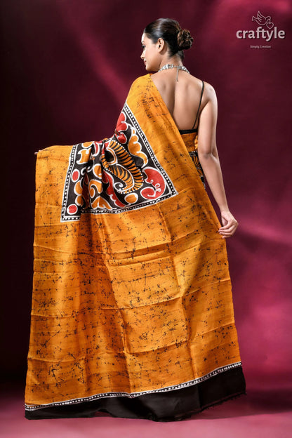 Carrot orange and black hand-painted wax batik pure mulberry silk saree vibrant orange batik saree bold 4