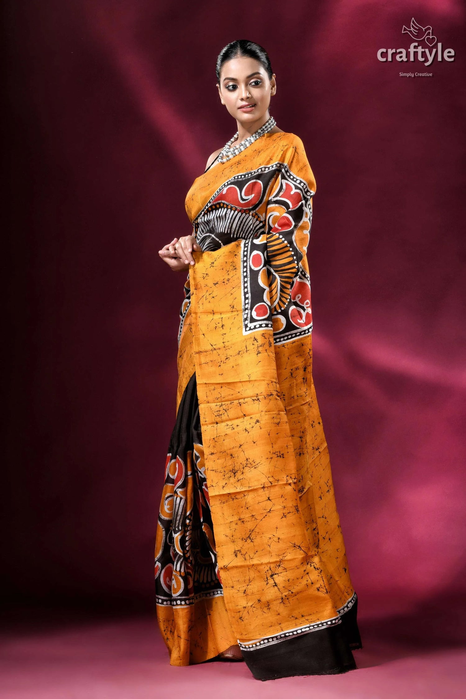 Carrot orange and black hand-painted wax batik pure mulberry silk saree vibrant orange black batik saree 3