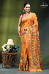 Carrot orange intricate gujrati stitched silk saree with mirror work vibrant orange saree intricate geometric 1