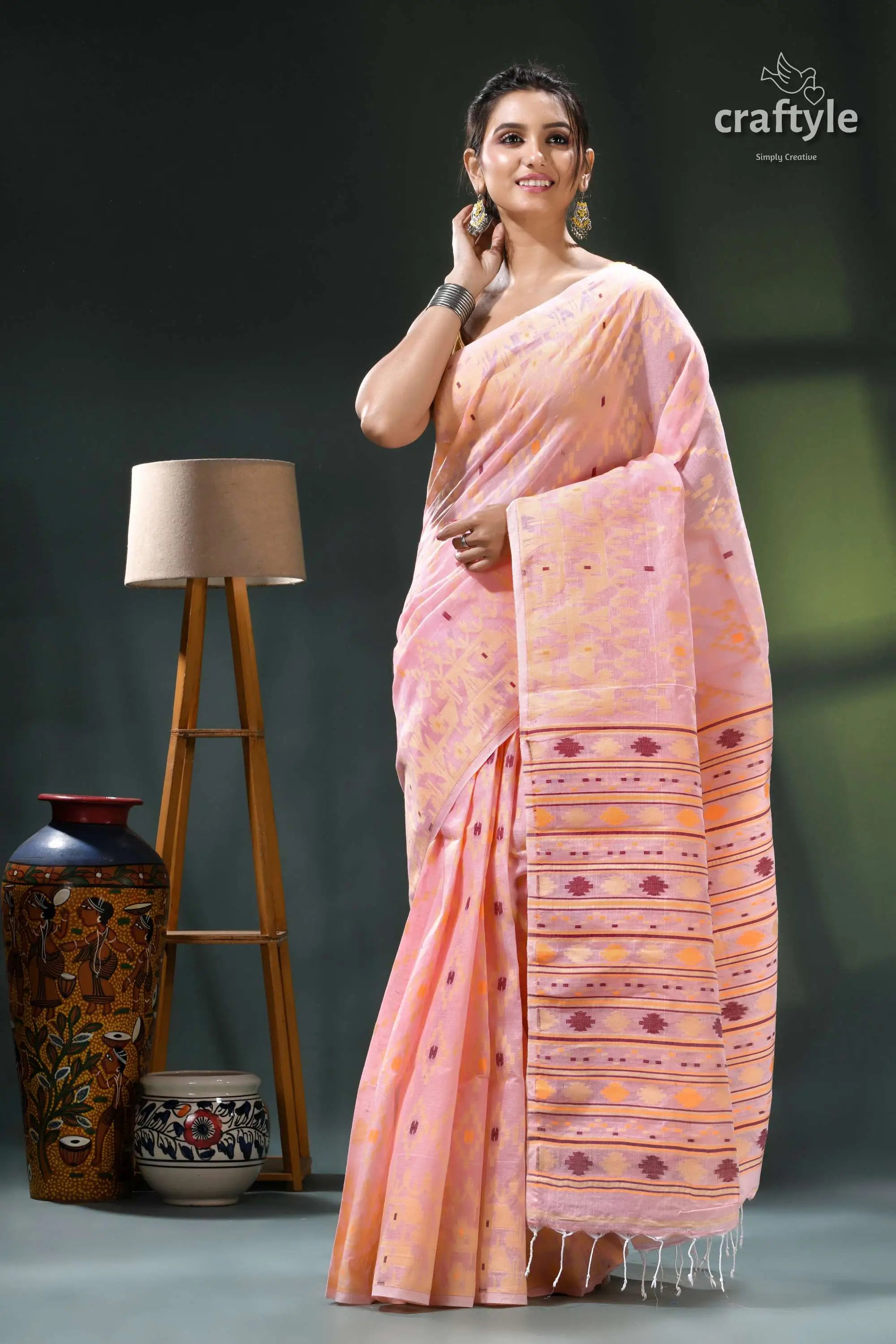 Cavern pink bengal handloom cotton jamdani saree peach-colored saree intricate geometric patterns 6