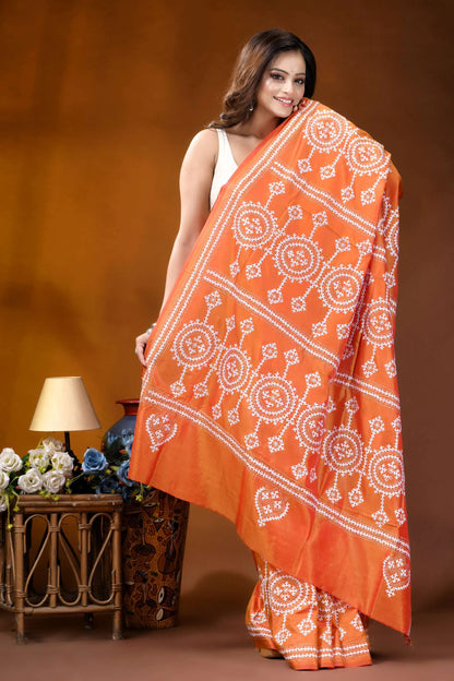 Circular motif hand embroidered silk kutch work saree in orange orange saree intricate white embroidered 4