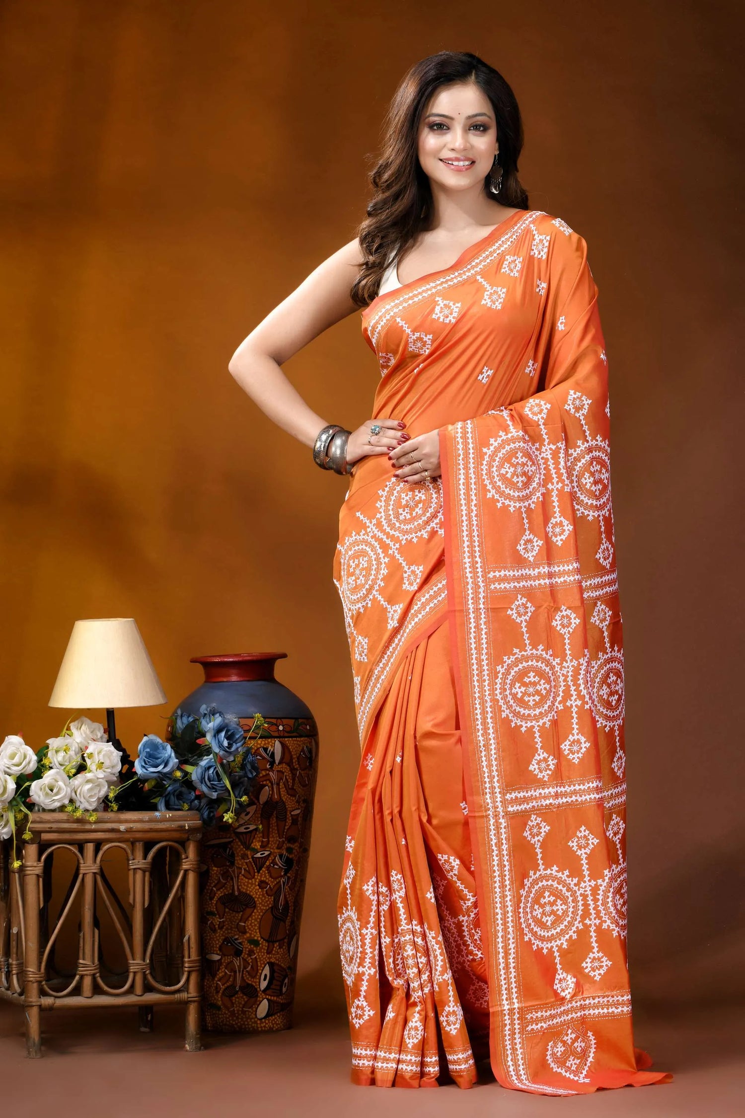 Circular motif hand embroidered silk kutch work saree in orange orange saree white embroidered patterns 6