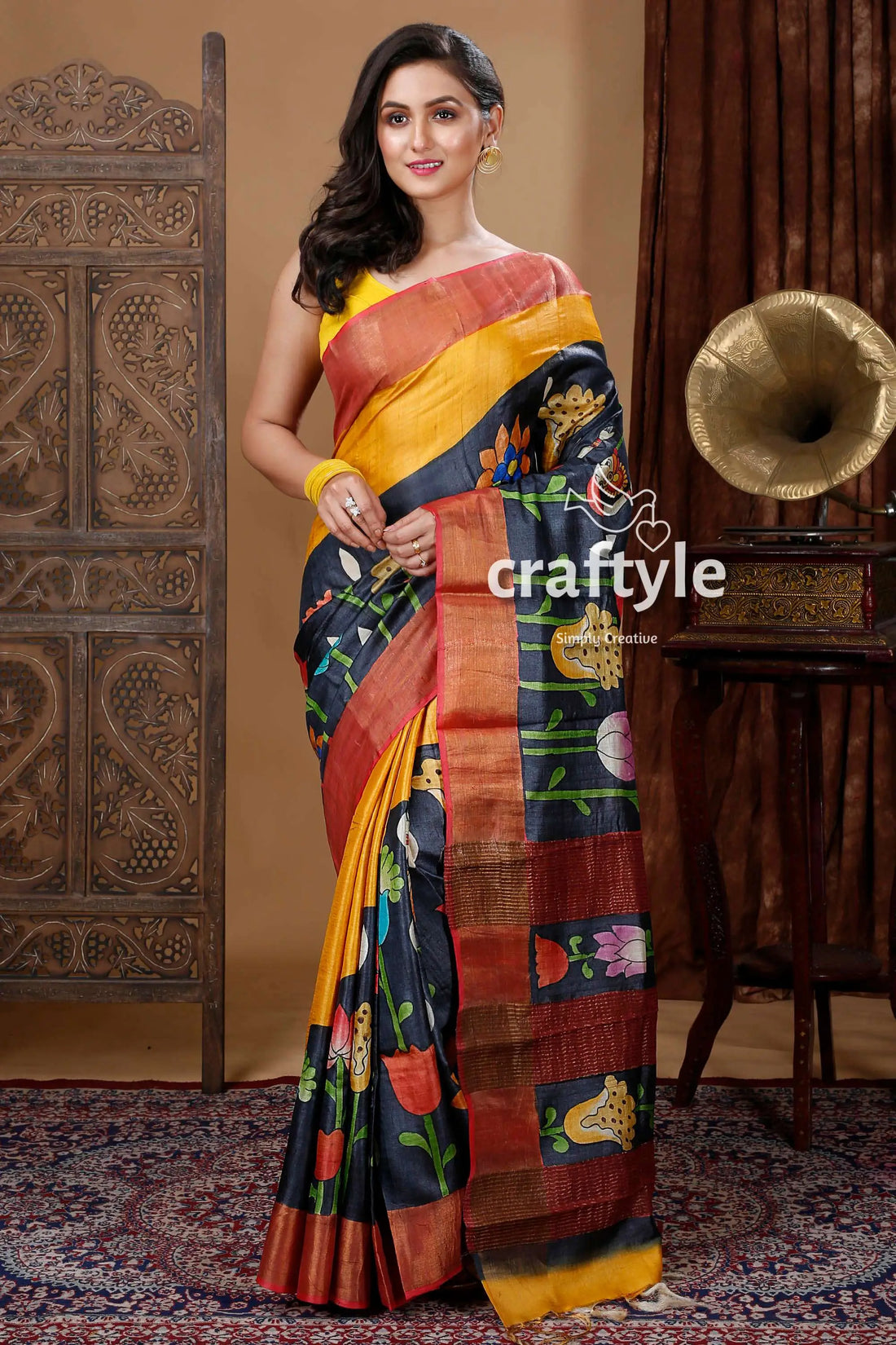 Coal black handcrafted zari border pure tussar kalamkari sari woman yellow black floral saree 1