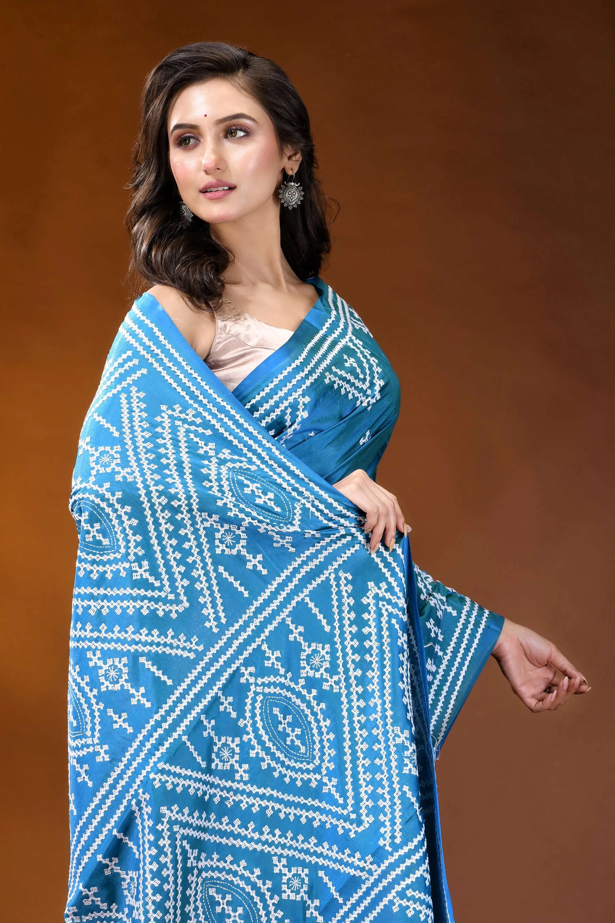 Curious blue ethnic motif handcrafted gujrati stitch silk saree vibrant blue saree intricate white 2