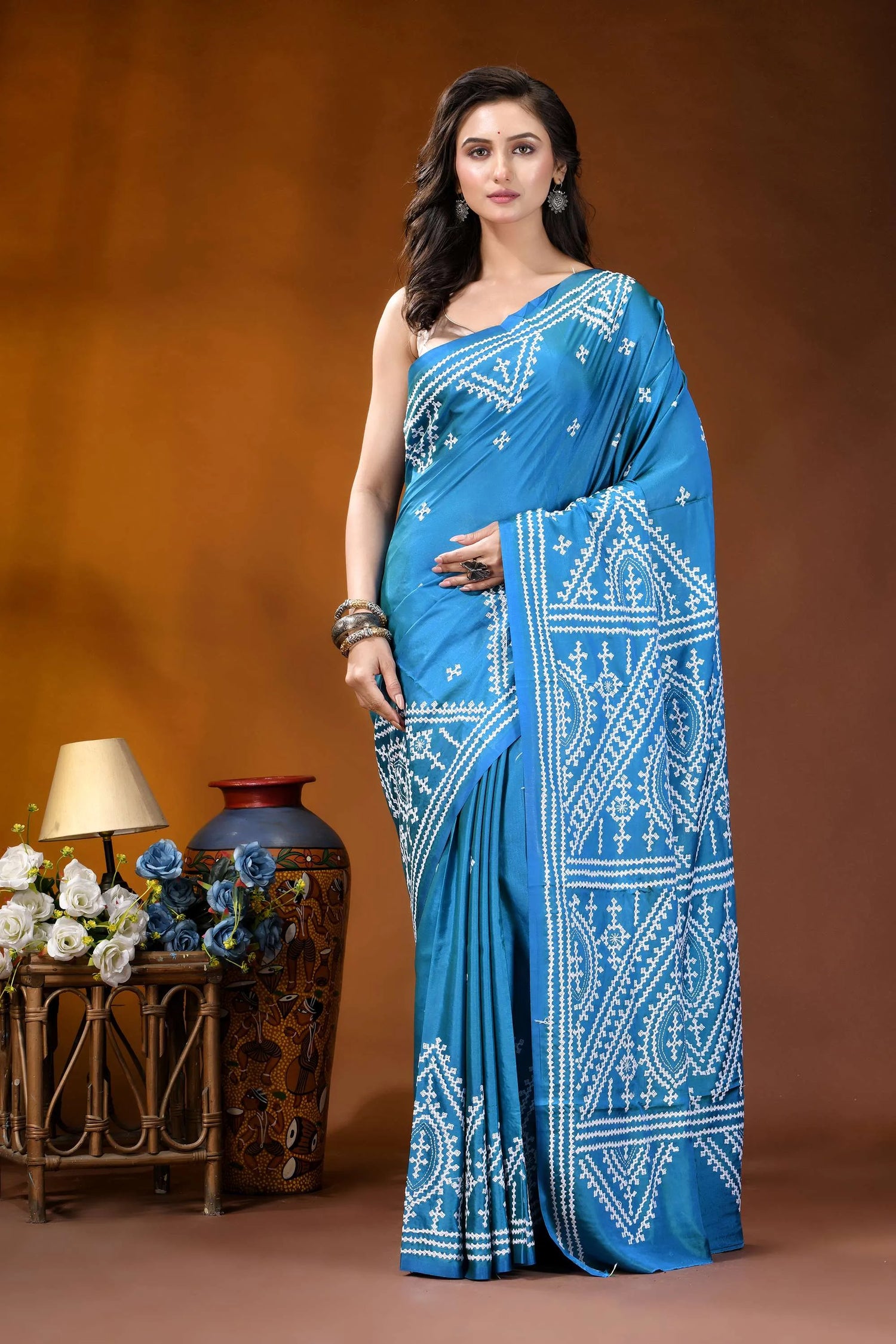 Curious blue ethnic motif handcrafted gujrati stitch silk saree vibrant blue saree intricate white 1