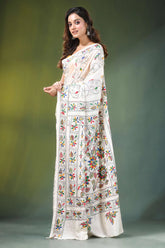 Daisy white hand embroidered floral motif kantha silk saree woman wears cream-colored 3