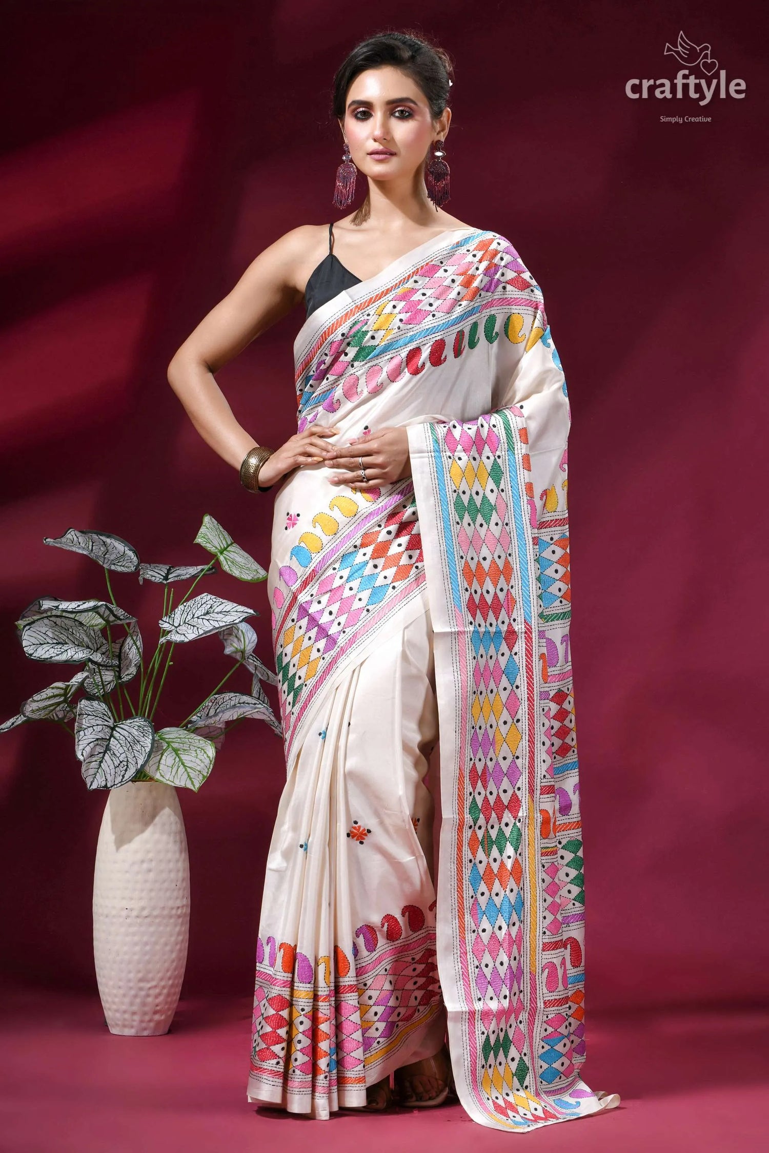 Daisy white multi-thread hand embroidered silk kantha work saree woman wears cream-colored saree vibrant 1