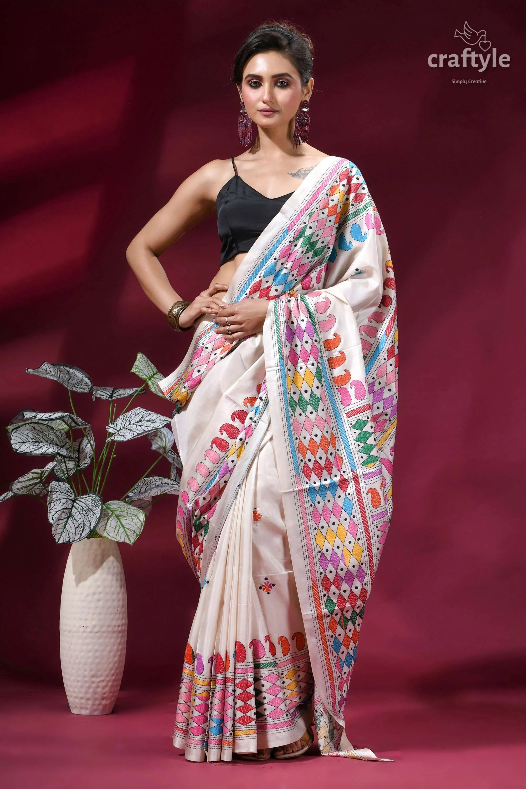 Daisy white multi-thread hand embroidered silk kantha work saree woman wears cream-colored silk saree 5