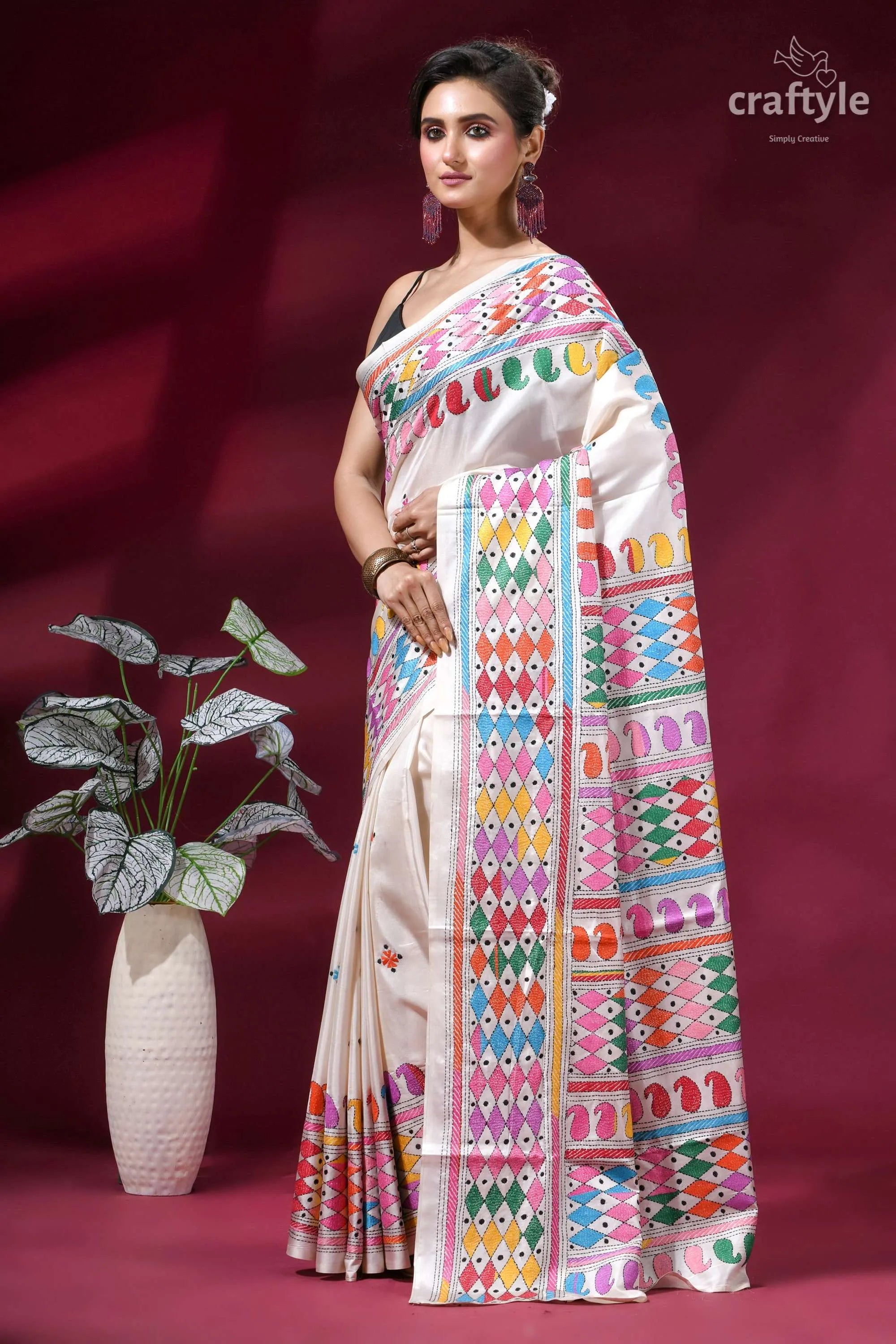 Daisy white multi-thread hand embroidered silk kantha work saree woman wears white saree adorned 3