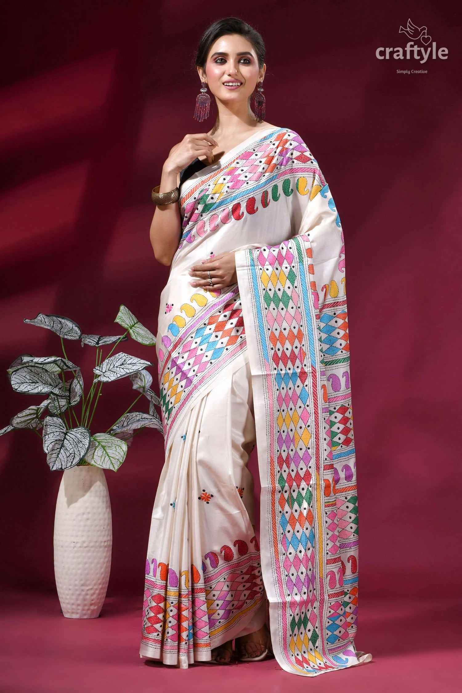 Daisy white multi-thread hand embroidered silk kantha work saree woman wears cream-colored silk saree 6