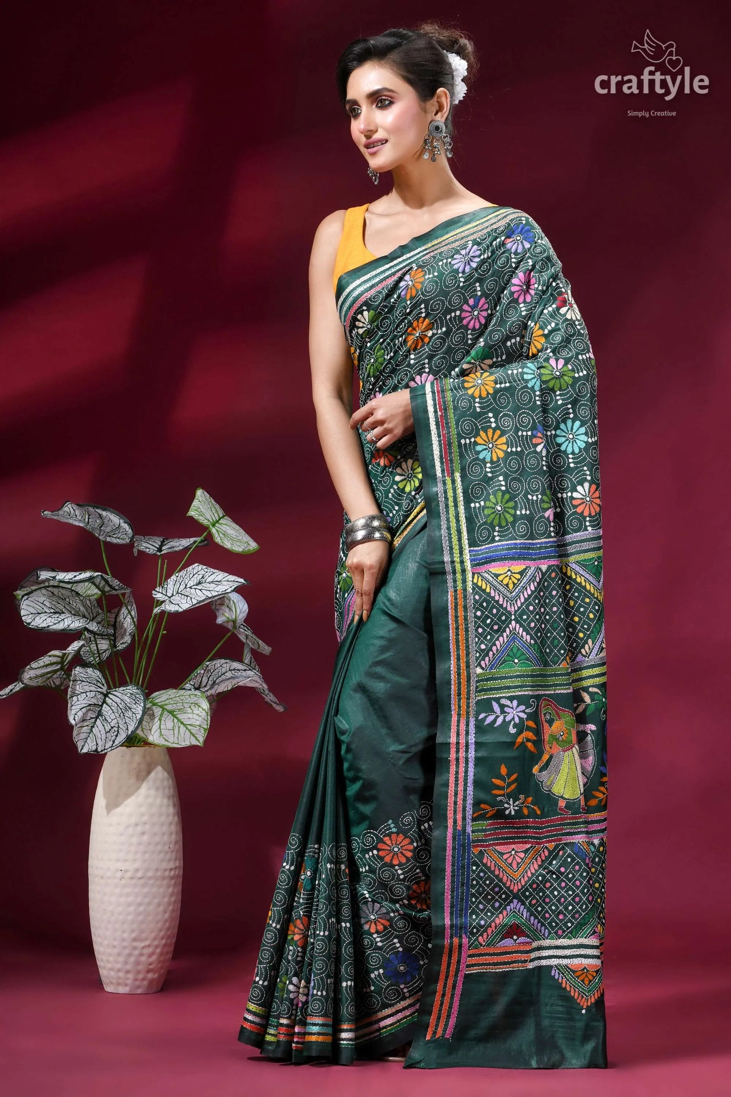 Dark green folk art design kantha stitched silk saree woman wears dark green silk 3