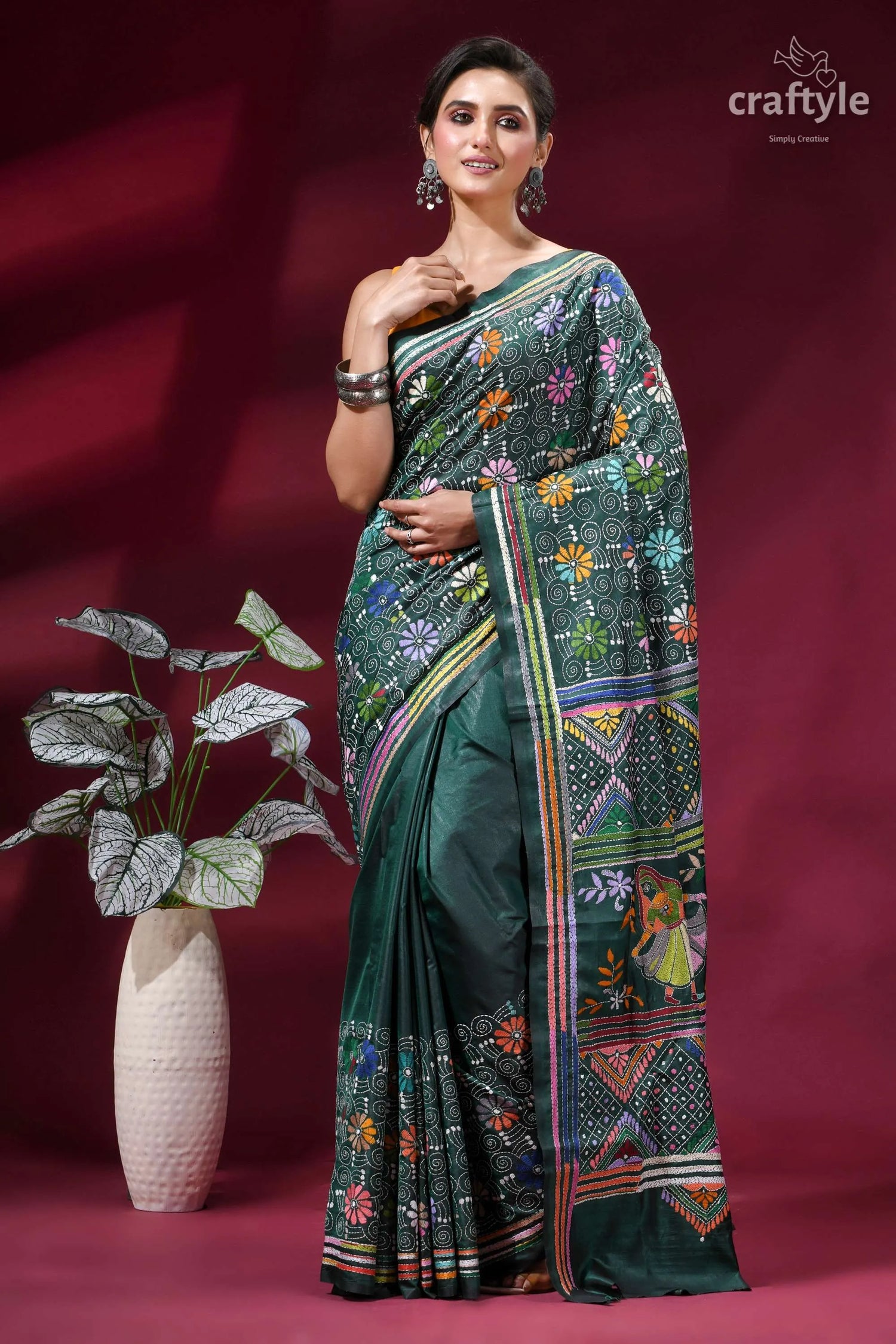 Dark green folk art design kantha stitched silk saree woman wears dark green silk 6