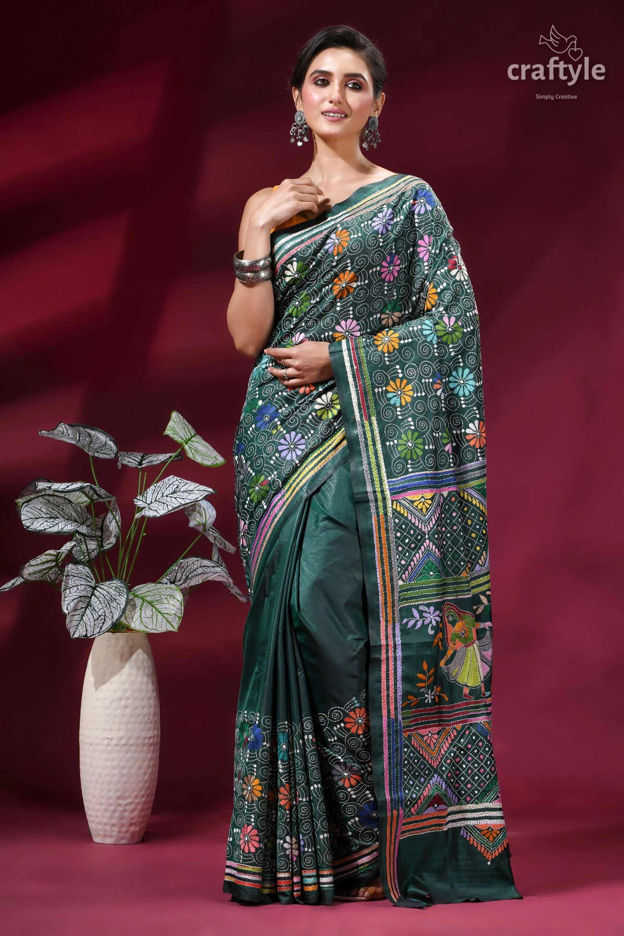 Dark green folk art design kantha stitched silk saree woman wears dark green silk 6