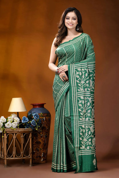 Dark spring green floral panel design handmade silk kantha saree woman wears vibrant green saree 1