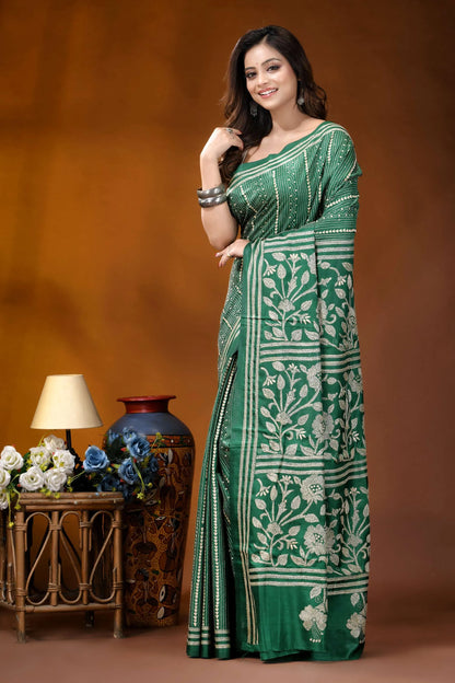 Dark spring green floral panel design handmade silk kantha saree woman wears vibrant green saree 3