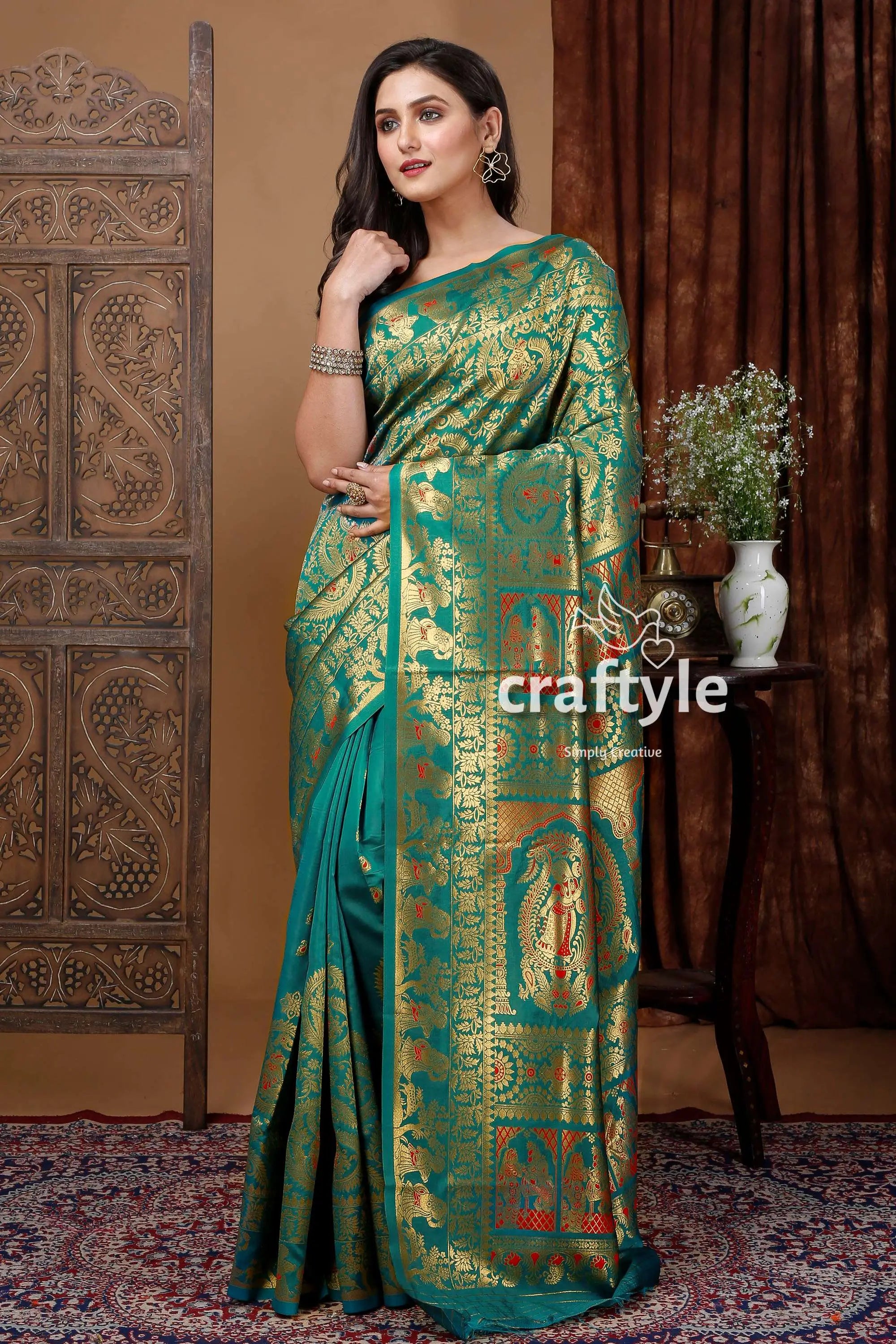 Deep green soft silk swarnachari saree golden zari meena work teal gold saree 1