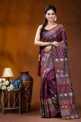 Deep plum multi-thread floral handcrafted silk lambani embroidery saree woman wears richly patterned purple 1