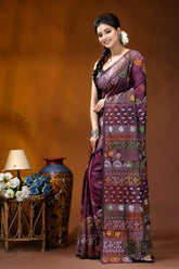 Deep plum multi-thread floral handcrafted silk lambani embroidery saree woman wears richly patterned purple 3